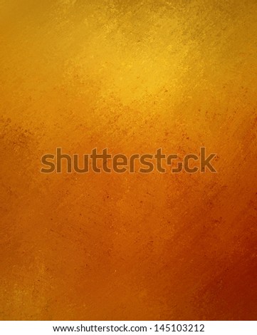Abstract gold background solid bright color  vintage grunge background texture old distressed design autumn background Halloween thanksgiving or Christmas luxury background gold paper foil wrap paper