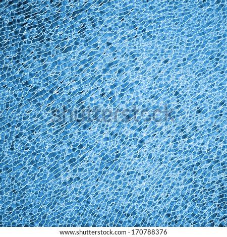 abstract blue glitter background with bumpy texture, glass or glossy shiny background, speckled detailed metallic effect, sparkly festive sky blue lights background decoration, luxury blue background