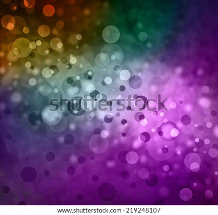 rainbow colors of bokeh lights background, beautiful floating bubbles in shades of the rainbow with bright sunny center light and darker border, round circle shapes in glittering sparkling layers