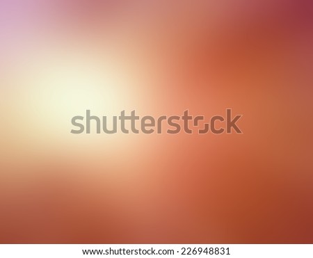 abstract orange peach pink blurred background colors in soft blended design