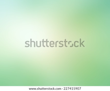 abstract pale green blurred background, white beige color spotlight in soft blended design