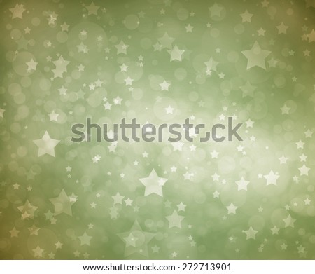 Stars on green background. Light green background with white stars. Glittering stars shining in sky. Fun spring or summer background.