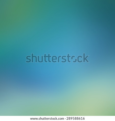 shades of blue an green in soft blurry background, shiny blue color splash on light blue green an yellow color
