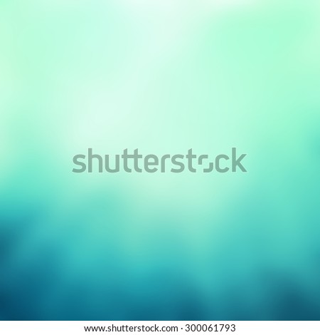 abstract green and blue background with streaked rays of soft light