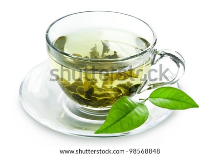 Cup with green tea and green leaves. Cup with green tea and green leaves.