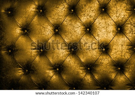 Luxury golden leather close-up background with great detail for background, check my port for a seamless version