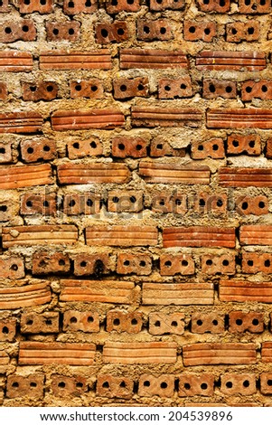 Red brick wall vertical background.