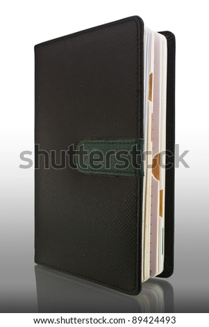 Leather cover note book with reflect on White Background .