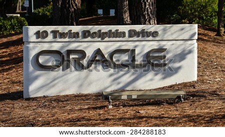 Redwood City, CA - Dec. 14, 2014: Oracle Corporation Logo. Founded in 1977, the Oracle Corporation is a high technology computer software and hardware company headquartered in Redwood City, CA., USA.