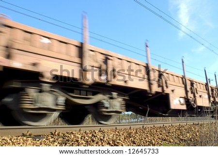 Fast moving cargo train with stock in Europe