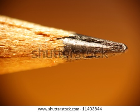 Macro of the tip of a pencil showing wood fibers and graphite