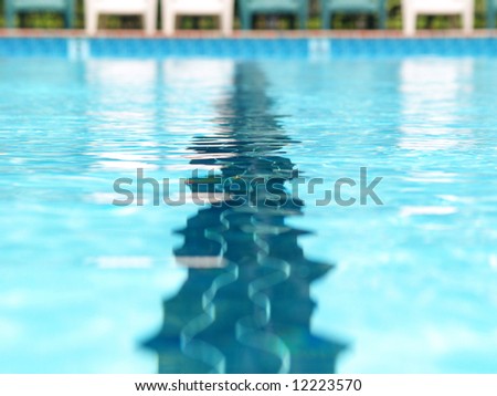 Closeup of the distortions of a swimming lane marker in a pool