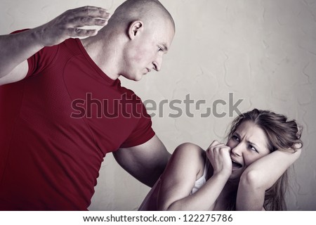 Woman victim of domestic violence and abuse. Husband beats his wife