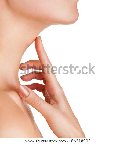 Closeup of a young woman regards her neck isolated on white background Closeup of a young woman regards her neck isolated on white background