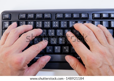 businessman typing on a keyboard, isolated on white background 6.
