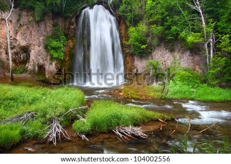 Summer view of Spearfish Falls in the Black Hills National Forest of South Dakota