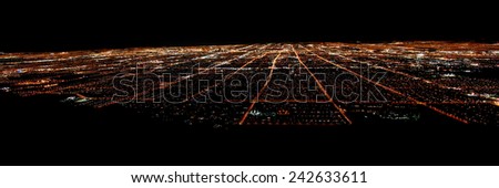 LAS VEGAS - NOVEMBER 26, 2011: Panoramic view of famous Las Vegas seen from elevation at night.  The Strip is world famous for its extravagant hotel casinos.