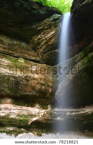 Water flows over beautiful Owl Canyon Falls at Starved Rock State Park of Illinoi