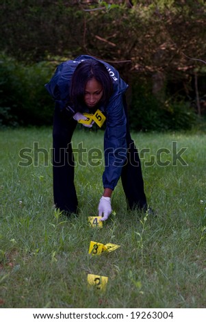 CSI places numbered markers near evidence.