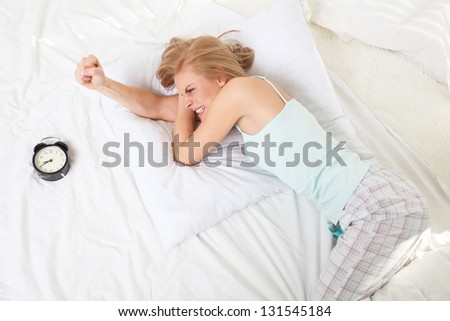 woman getting up in the morning