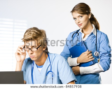 Doctor and nurse at doctors office