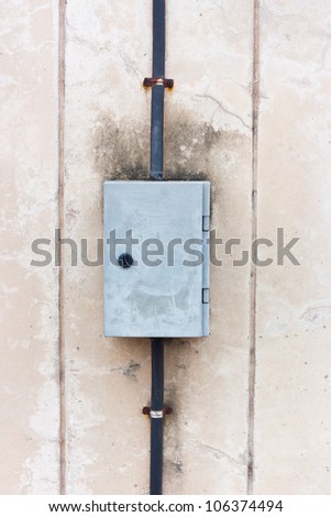 electrical box on old dirty wall