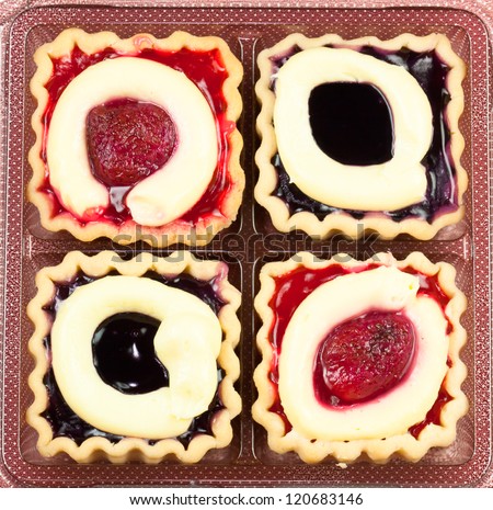 Close-up bakery cherry jam cake cup