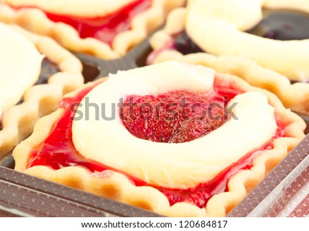 Close-up bakery cherry jam cake cup