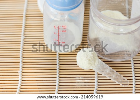 powdered milk and spoon for baby