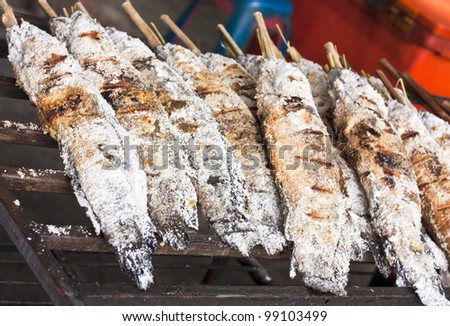 grill snake head fish with salt coated