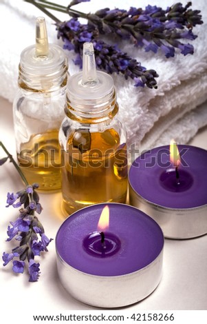 Lavender Essential Oil, Scented Candles And Fresh Flowers Stock ...