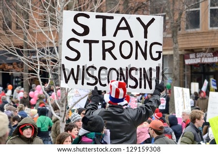 MADISON, WI - MARCH 3:Protesters in Wisconsin during a rally against Governor Scott Walker\'s budget bill on Mar 3, 2011. Walker has won the recall election, but he still faces a new election next year