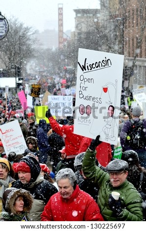 MADISON, WI - FEB 26:Protesters in Wisconsin during a rally against Governor Scott Walker\'s budget bill on Feb 26, 2011. Walker has won the recall election, but he still faces a new election next year