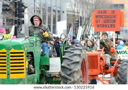 MADISON, WI - MARCH 12:Farmers in Wisconsin rally against Governor Scott Walker\'s budget bill on Mar 12 , 2011. Walker has won the recall election, but he still faces a new election next year