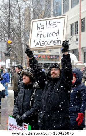 MADISON, WI - FEB 26:Protesters in Wisconsin during a rally against Governor Scott Walker\'s budget bill on Feb 26, 2011. Walker has won the recall election, but he still faces a new election next year