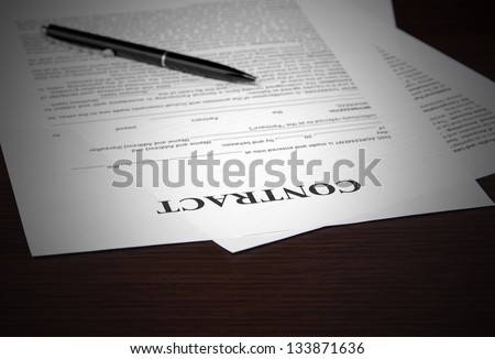 The contract on desktop, selective focus image on sign a contract