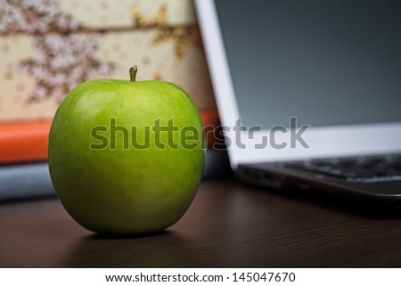 Apple on a table in the office
