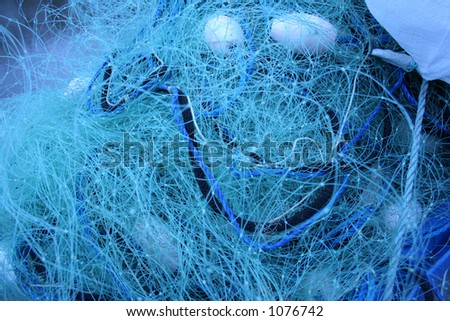 Tons of knotted fishing nets