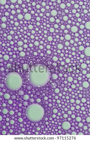 Picture a foam bubble purple macro background.