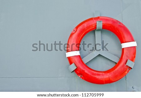 Life buoy on the battleship wall
