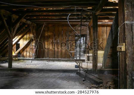 chimney pipe, spiral stairs and open, roof construction door at attic roof space