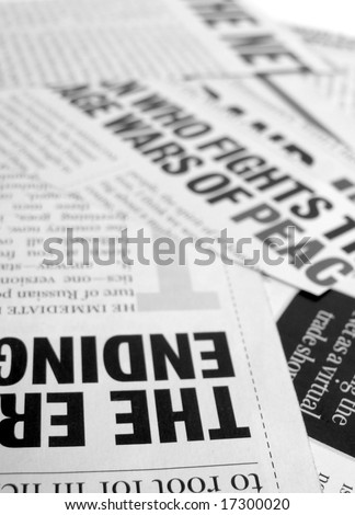 Close up of new paper headlines