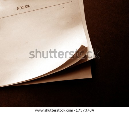 Writing old note paper on wood background