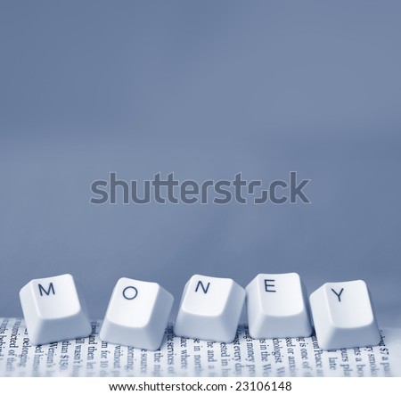 Close up of computer keys with money word
