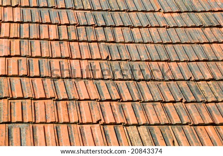 Closeup of old red roof tiles