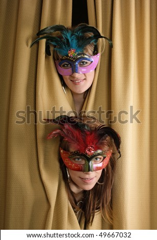 Two masked girls at theater