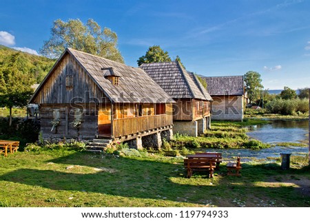 Old historic village with wooden cottages on Gacka river source, Majerovo vrilo, Lika, Croatia