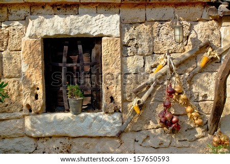 Traditional dalmatian stone house window with ornaments, Dalmatia, Croatia