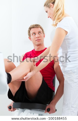 Patient at the physiotherapy making physical exercises with his therapist