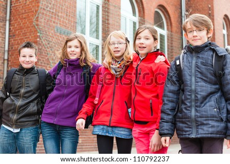 Education - Pupils at schoolyard of their school during recess